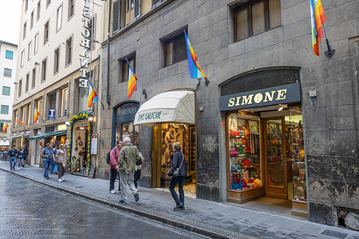 Clothing and handbag stores at Via de Guicciardini at Florence in Tuscany, Italy