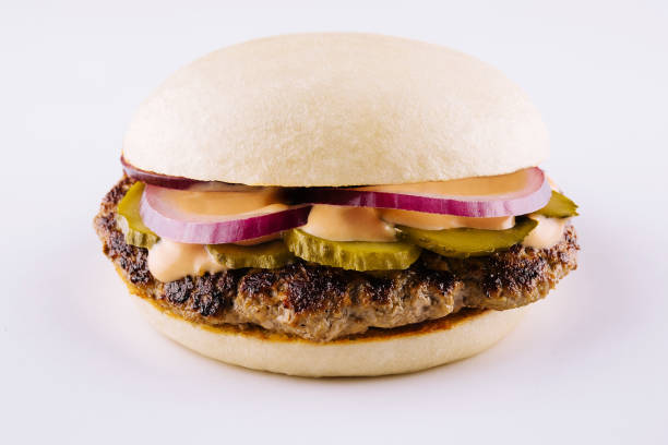 istock Burger with pork cutlet on white background 1450329121