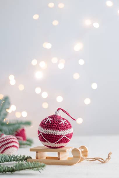 istock Beautiful cute crocheted christmas ball for decoration with copyspace 1450329494