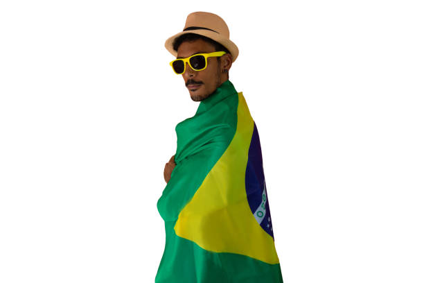 istock Handsome Young Black Man With Glasses Dressed for Brazil Carnival. 1450329564