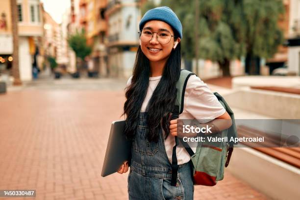 Asian Female Tourist Student On City Streets Stock Photo - Download Image Now - Student, Young Adult, University