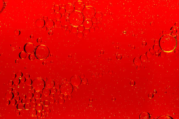 istock Macro red bubbles,abstract red wine bubbles, close-up shot,Oil and water drops background 1450331908