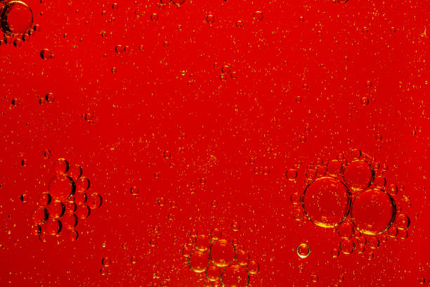 istock Macro red bubbles,abstract red wine bubbles, close-up shot,Oil and water drops background 1450332185