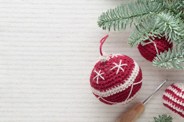 istock Beautiful cute crocheted christmas balls for decoration Horizontal Banner with copyspace 1450332201