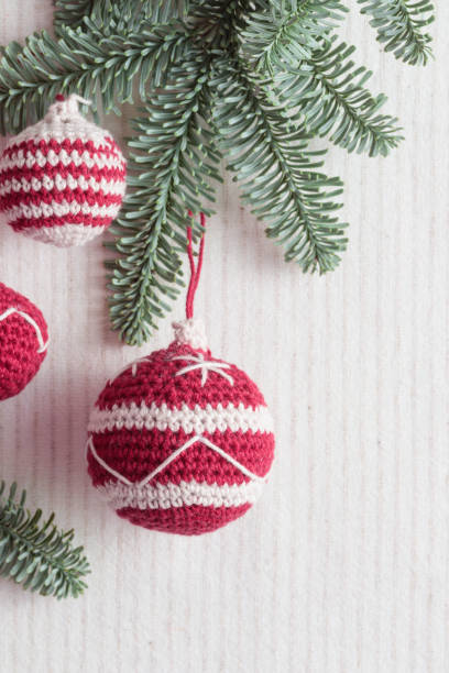 istock Beautiful cute crocheted christmas balls for decoration with copyspace 1450332213