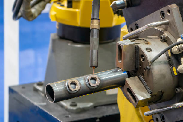 istock The automatic welding robot working with automotive parts assembly processing. 1450332280