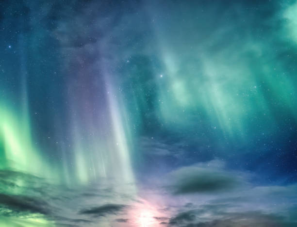 istock Beautiful Aurora borealis and starry glowing in the night sky on arctic circle 1450332623