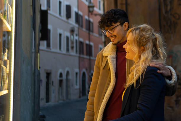 istock Multiethnic couple looking at a shop window 1450333861
