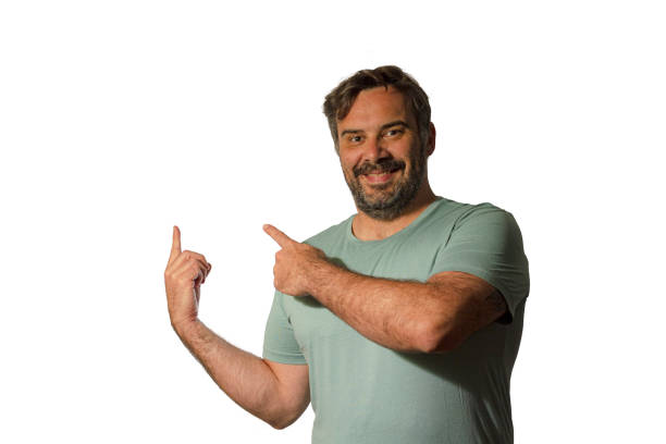 Man pointing fingers up to empty space isolated on a white background