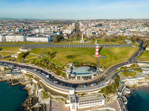 Plymouth, UK. 16 December 2022. View over Plymouth Hoe with cafes and cars parked.