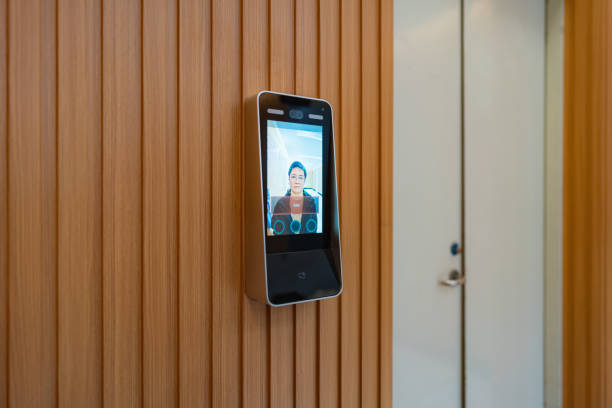 istock Close-up of a man using facial recognition technology to unlock a gate 1450334417