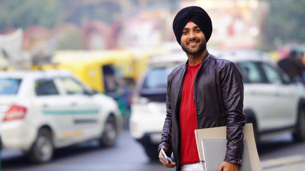 istock boy going college Studying with Using A Textbook stock photo Sikhism Student 1450335853