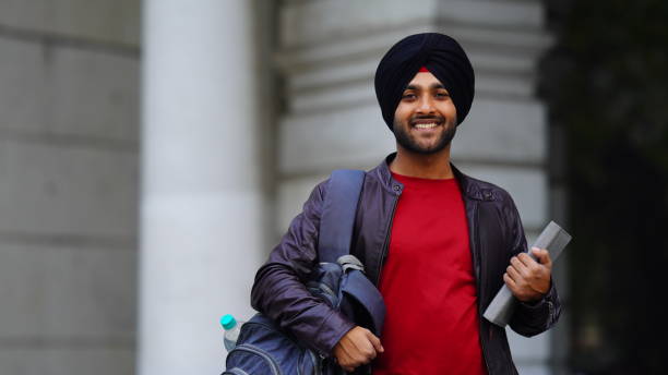 istock sikh college student image Young punjabi boy with confidence and bag 1450335900