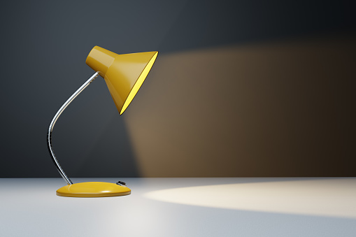 Yellow desk lamp with a light cone shining spot light on the table. Illustration for copy space background