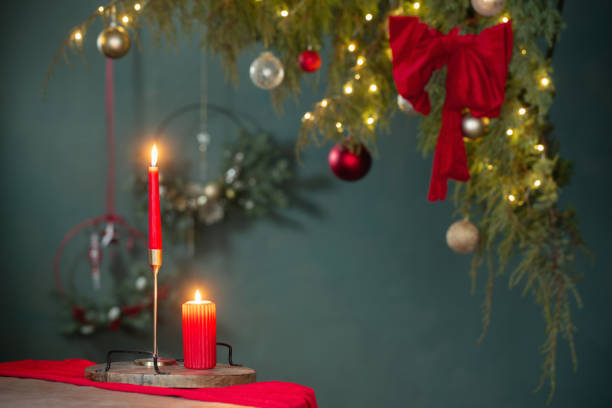 istock red  and golden christmas decor on table on dark background 1450345040