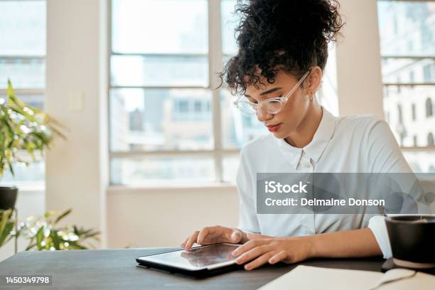 Tablet Online And Black Woman In Office Social Media Or Connect For Conversation Typing Or Chat Entrepreneur African American Female Or Confident Girl With Device To Search Internet Or Workplace Stock Photo - Download Image Now