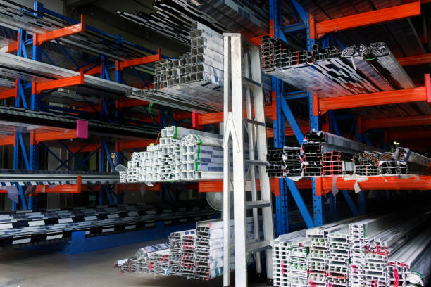 istock Various shape profiles and tubes on warehouse shelf 1450351779