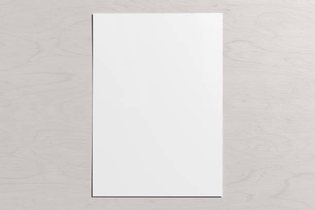 чистый лист бумаги макет на белом деревянном столе. - paper blank white page стоковые фото и изображения