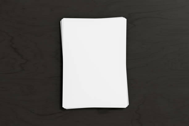 istock Stack of paper mockup on the black background 1450355338