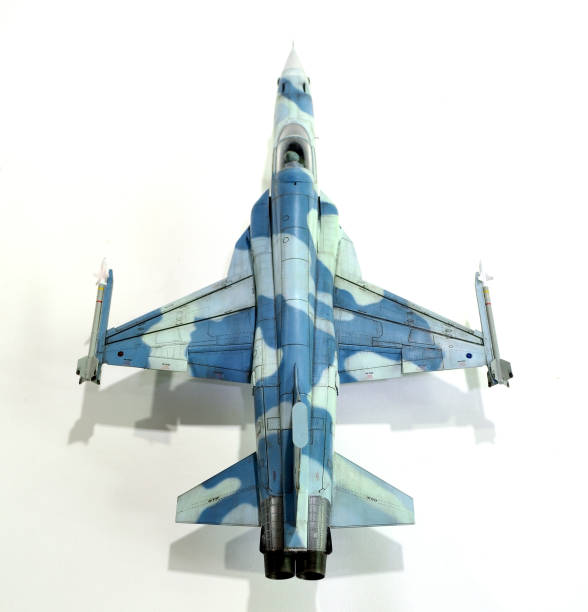 istock Top view of a fighter jet model on white background. 1450357577