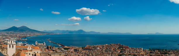 Old city of Naples and volcano Vesuvius. Old city of Naples and volcano Vesuvius. columbus avenue stock pictures, royalty-free photos & images