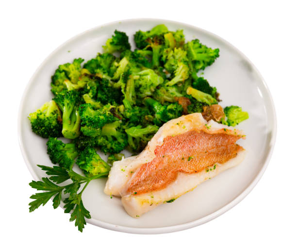 istock Appetising roasted rockfish fillet with seared broccoli 1450359365