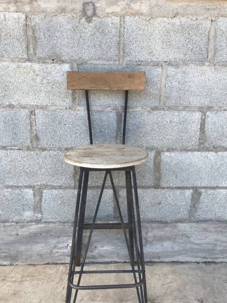 istock Chair in brick room 1450359928