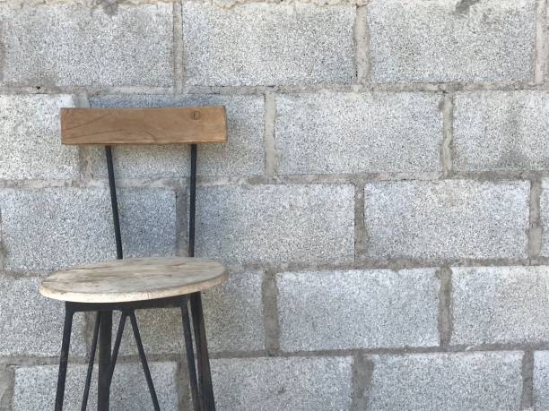 istock Chair in brick room 1450360032