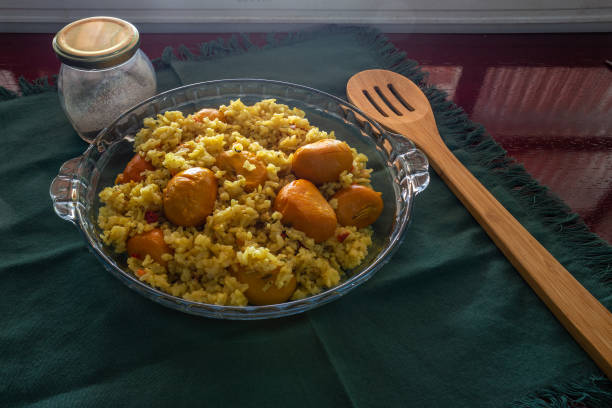 istock Brown rice with pequi. (Caryocar Brasiliense) 1450366422