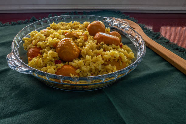 istock Brown rice with pequi. (Caryocar Brasiliense) 1450366428