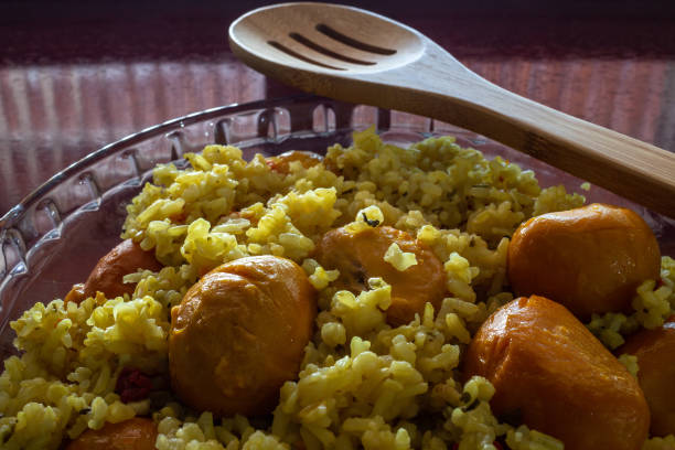 istock Brown rice with pequi. (Caryocar Brasiliense) 1450366466