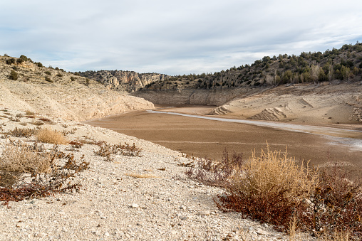 View of a reservoir without water due to a dry spell.