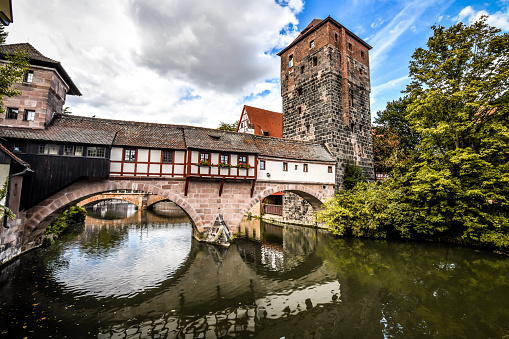 Tower And Houses On Pegnitz River Seen In Nuremberg, Germany