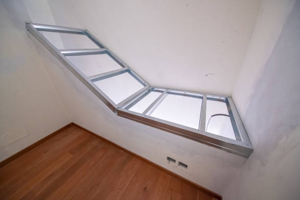 istock Cabinet under construction along an oblique wall. Moving to a new house concept 1450370052
