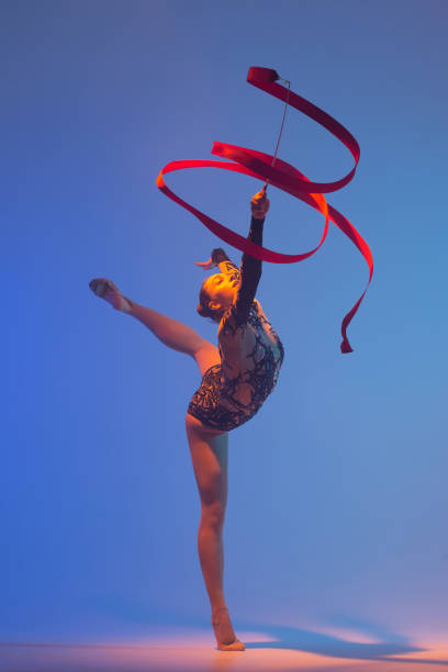 istock Beautiful woman rhythmic gymnast 1450370319