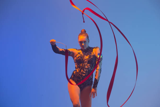 istock Beautiful woman rhythmic gymnast 1450370395