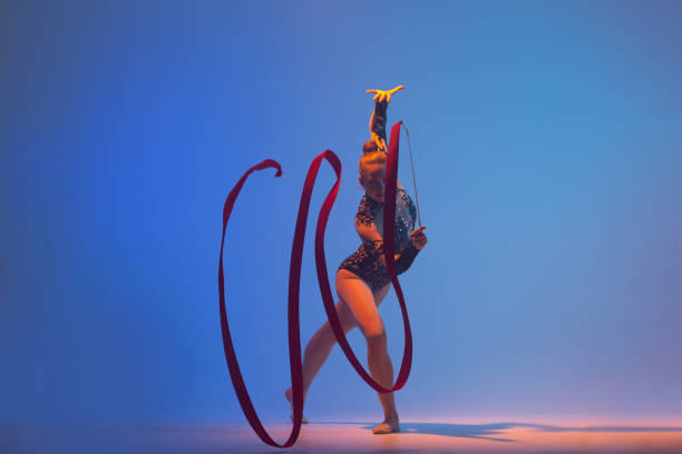 istock Beautiful woman rhythmic gymnast 1450370435