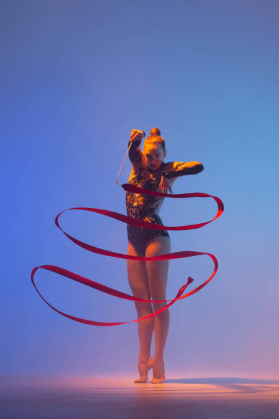 istock Beautiful woman rhythmic gymnast 1450370551