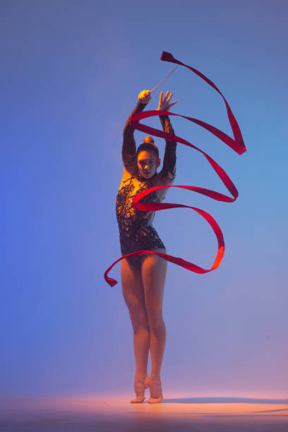 istock Beautiful woman rhythmic gymnast 1450370598