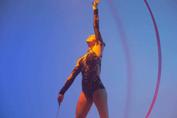istock Beautiful woman rhythmic gymnast 1450370601