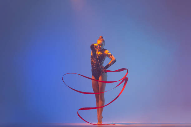 istock Beautiful woman rhythmic gymnast 1450370618