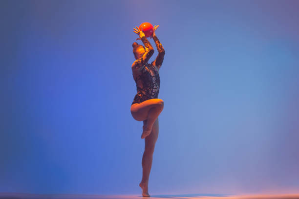 istock Beautiful woman rhythmic gymnast 1450370694