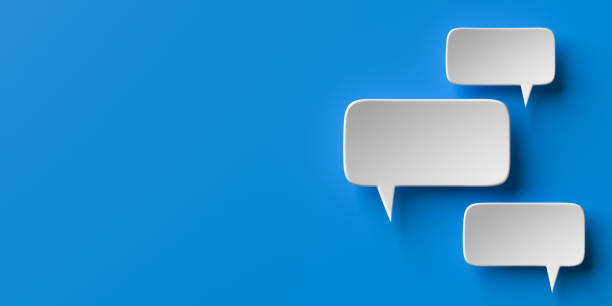 istock Social media notification icons, white speech bubbles on blue background copy space. 1450373068