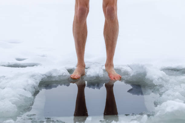 istock Winter hardening in cold water. 1450373145