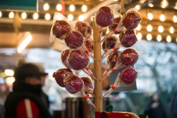 Closeup of red love apple at the christmasmarket in the street