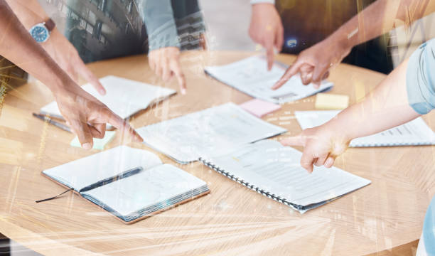 istock Strategy, planning and documents for meeting with overlay  for marketing, project management or collaboration. Data, research and innovation with business people working on idea, teamwork and review 1450382181