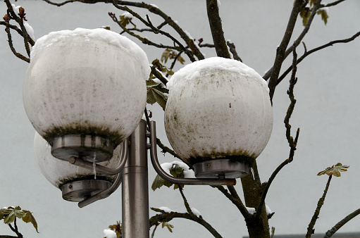 Symbolic image, winter, cold: Snow on a lantern