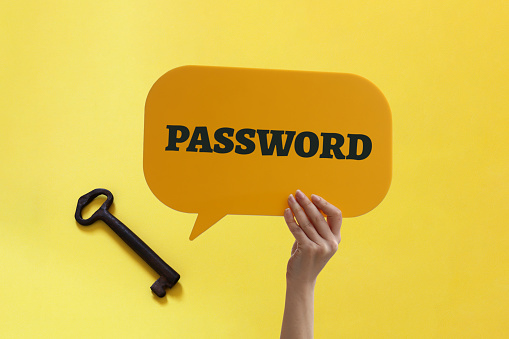 The word of Password on speech bubble with old key