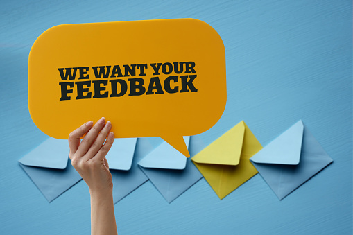 We want your feedback word with speech bubble