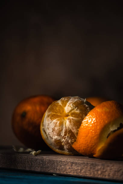 istock Close up on orange on rustic wooden table. 1450391883